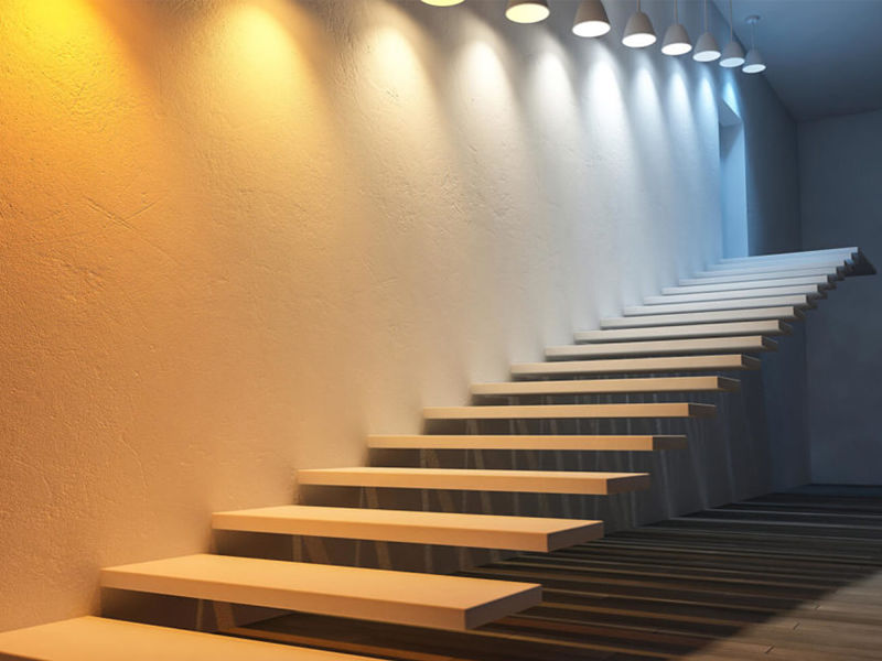 escada iluminada com led de diferentes cores e temperaturas